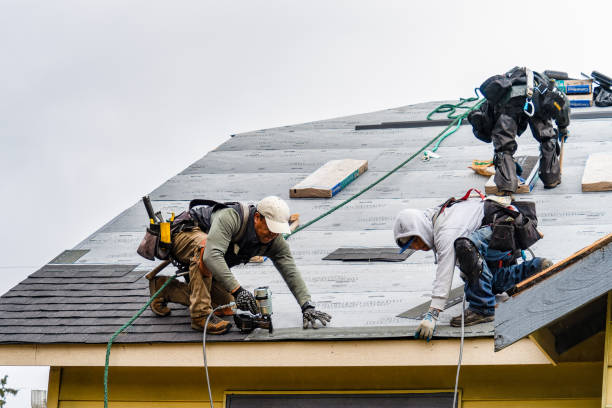 Professional Gutter Installation technician working in Hampstead, NH